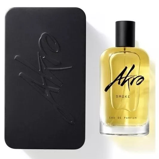 Perfume bottle labeled 'Alfro Smoke' next to a black rectangular product with 'Alfro' branding.