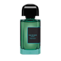 Green perfume bottle with black cap on a white background